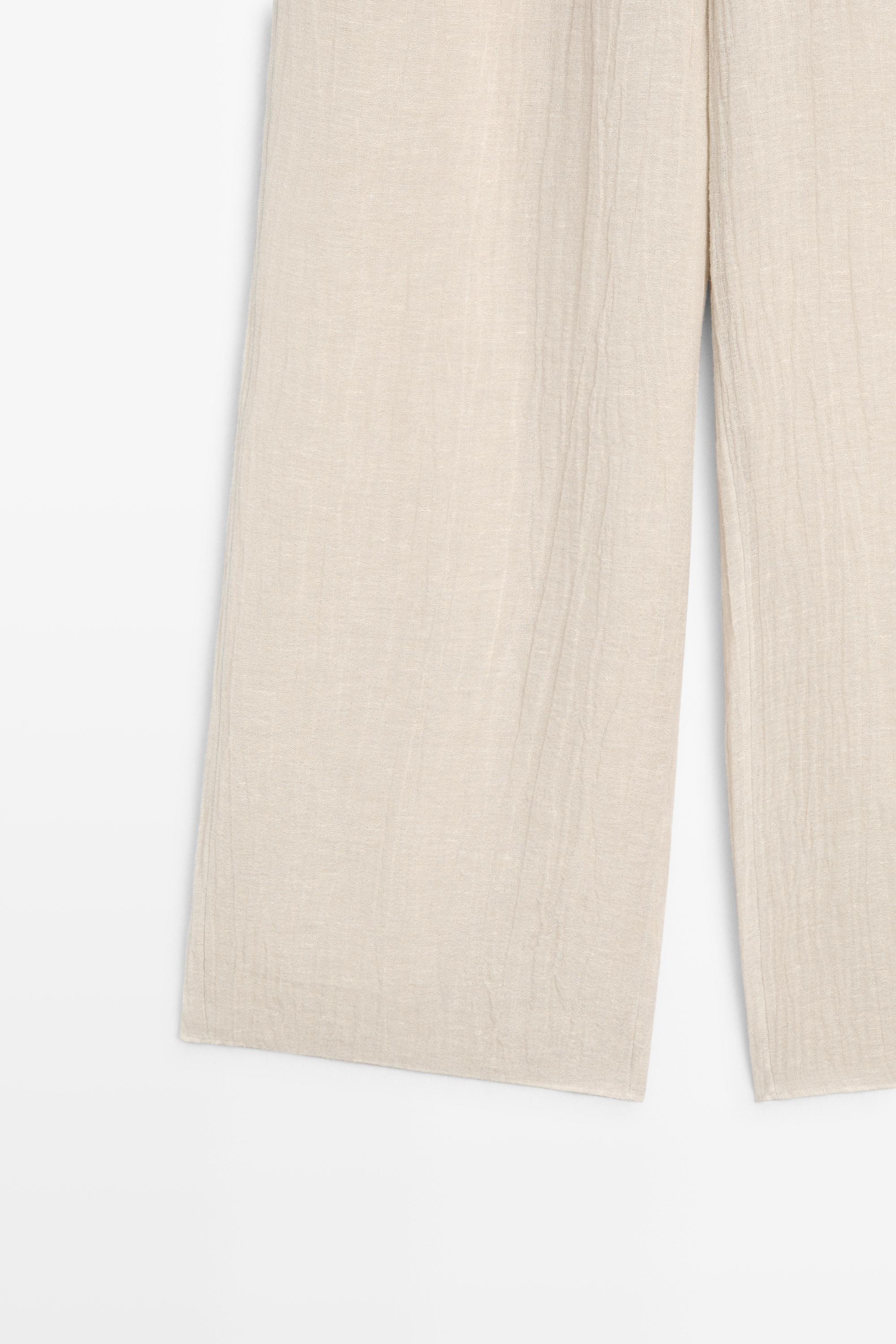 Total look flowing waffle-knit linen blend trousers